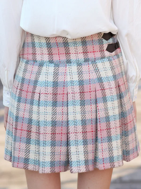 punctual in plaid skirt